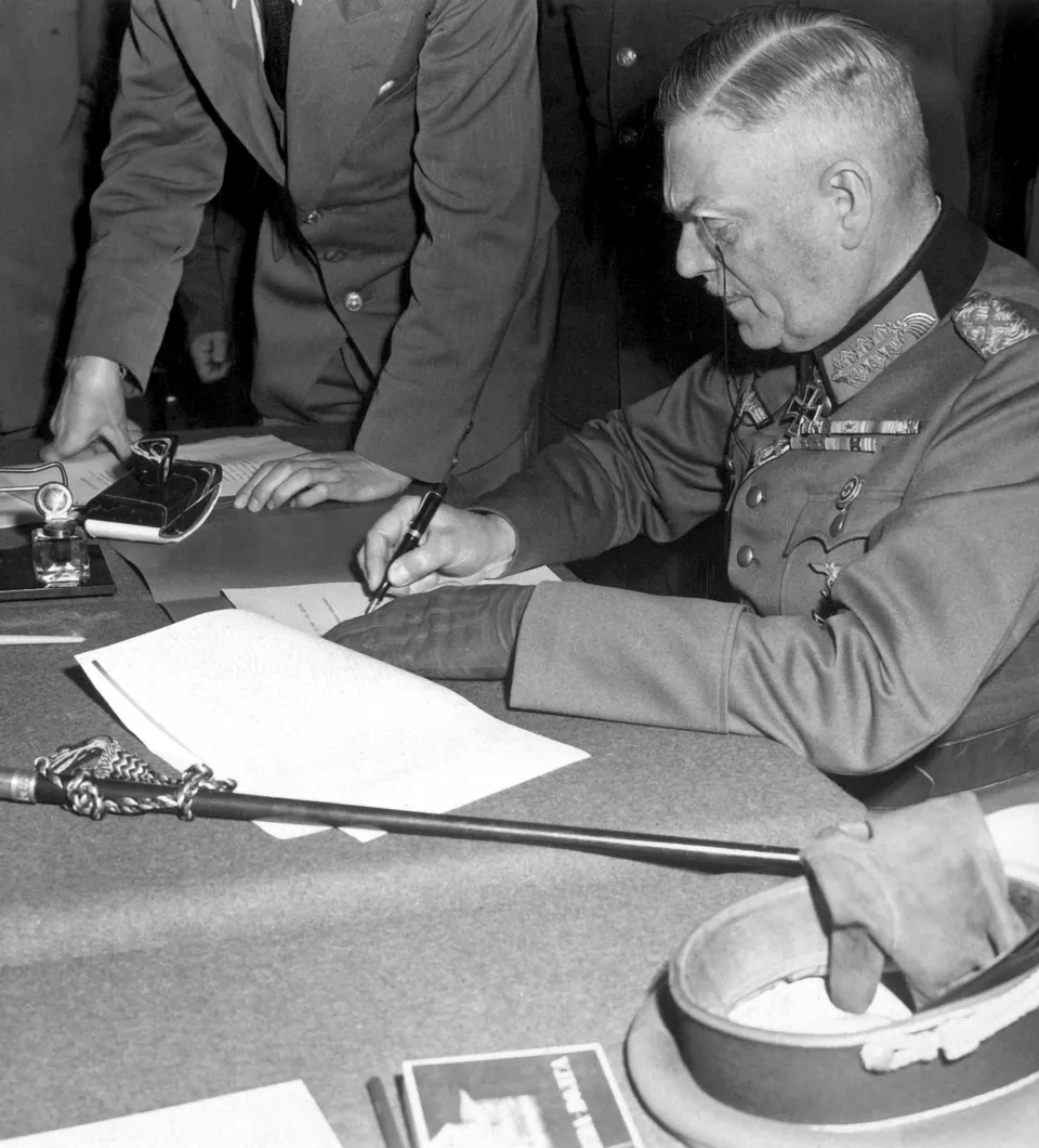 20190615072619!Field_Marshal_Keitel_signs_German_surrender_terms_in_Berlin_8_May_1945_-_Restoration